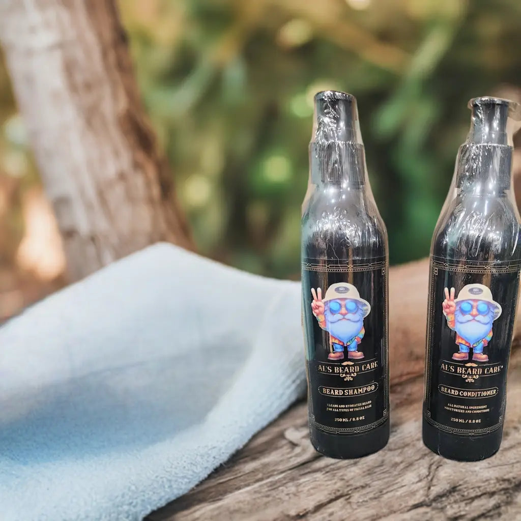 Two bottles of 'Al'S BEARD CARE' products on a wooden surface with a blurred natural background.